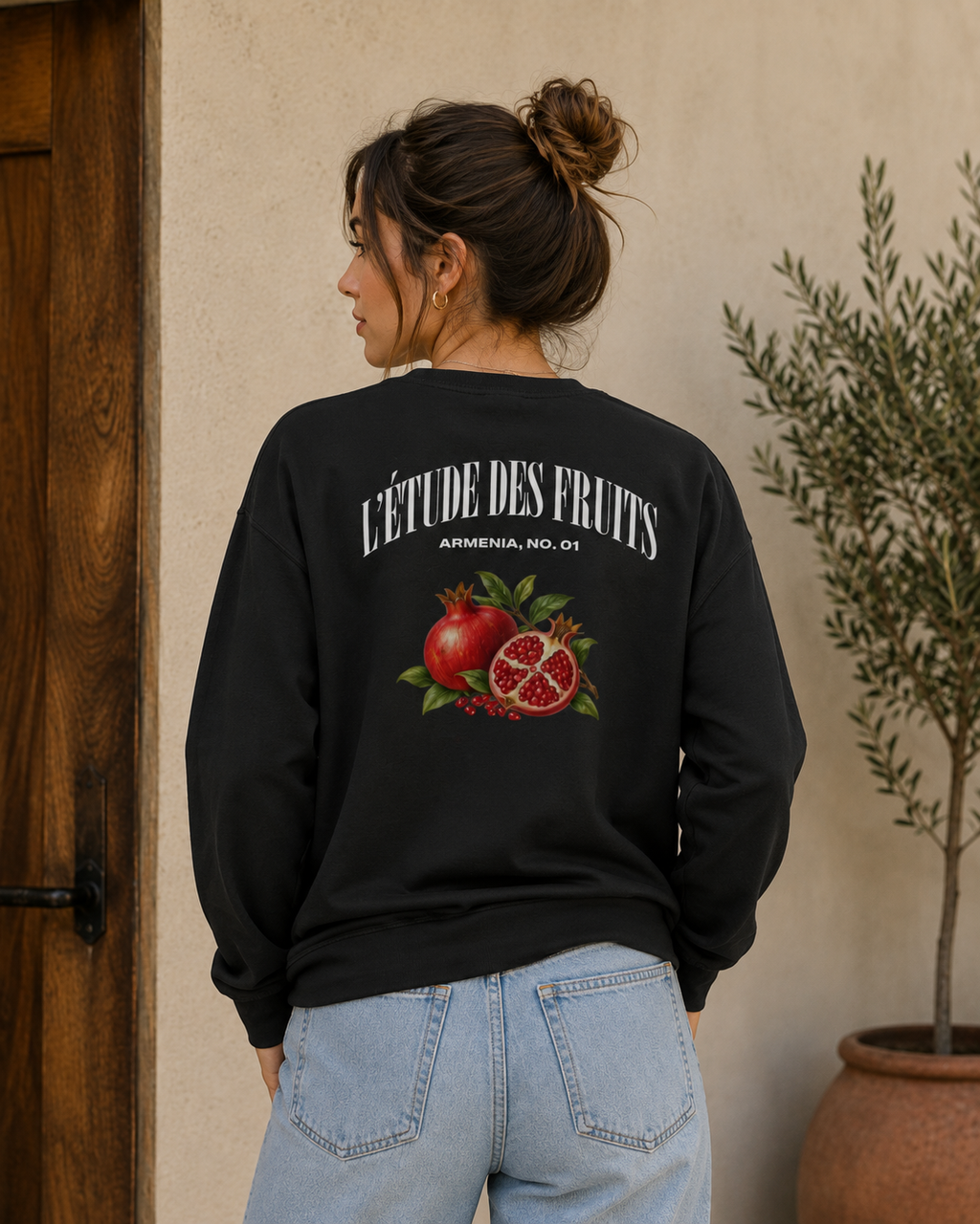 Lifestyle shot of Armenian pomegranate heavyweight long sleeve tee