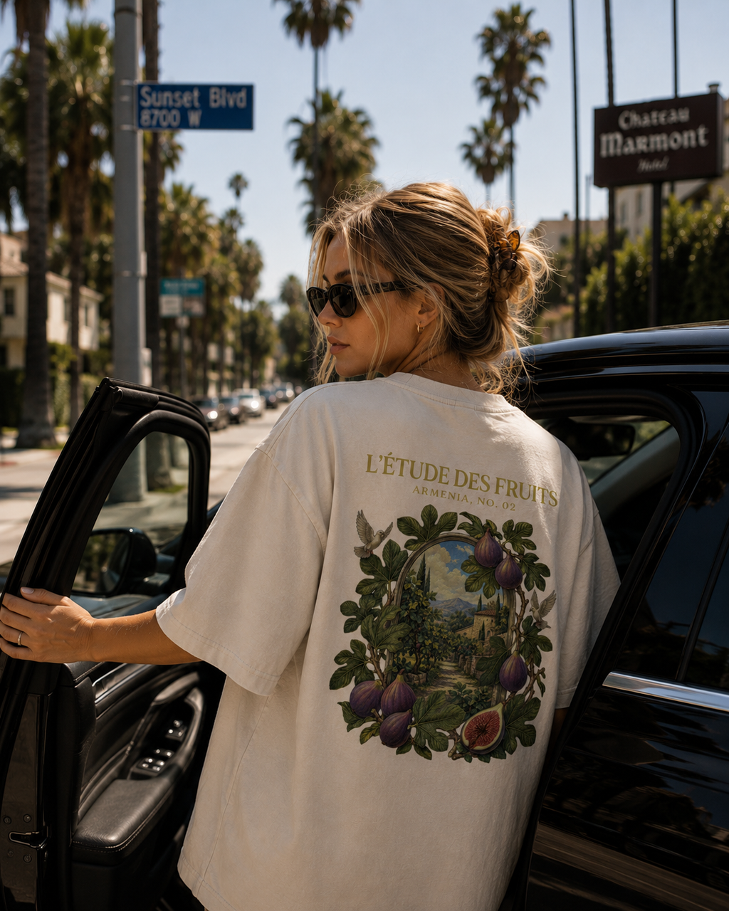 Woman wearing L'Étude des Fruits Armenia No. 02 fig garden back graphic heavyweight tee