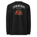 Detail shot of pomegranate artwork on black long sleeve